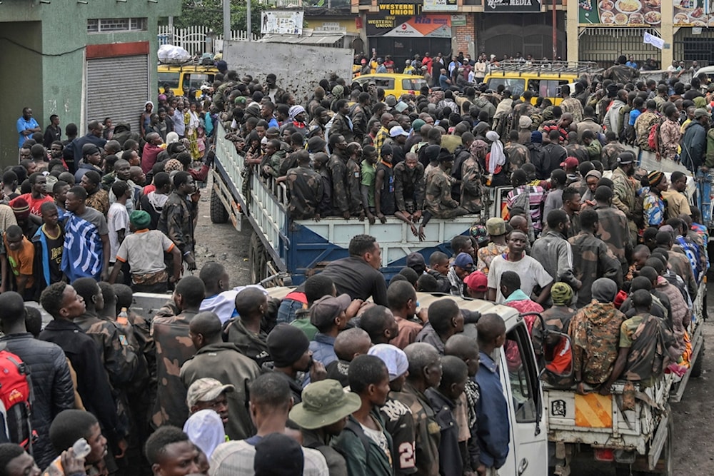 M23 rebels escort government soldiers and police who surrendered to an undisclosed location in Goma, Democratic republic of the Congo, Thursday, Jan. 30, 2025 (AP)