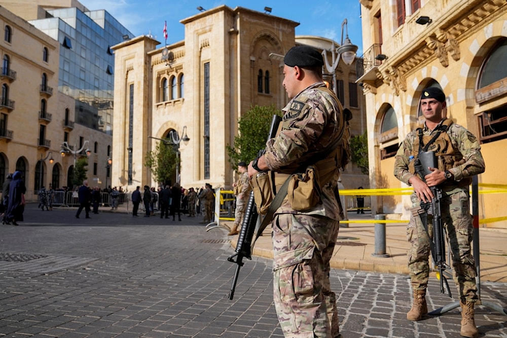 Lebanese army soldiers stand guard in front of the parliament building before a session to elect a new Lebanese president in downtown Beirut, Lebanon, Thursday, Jan. 9, 2025 (AP)