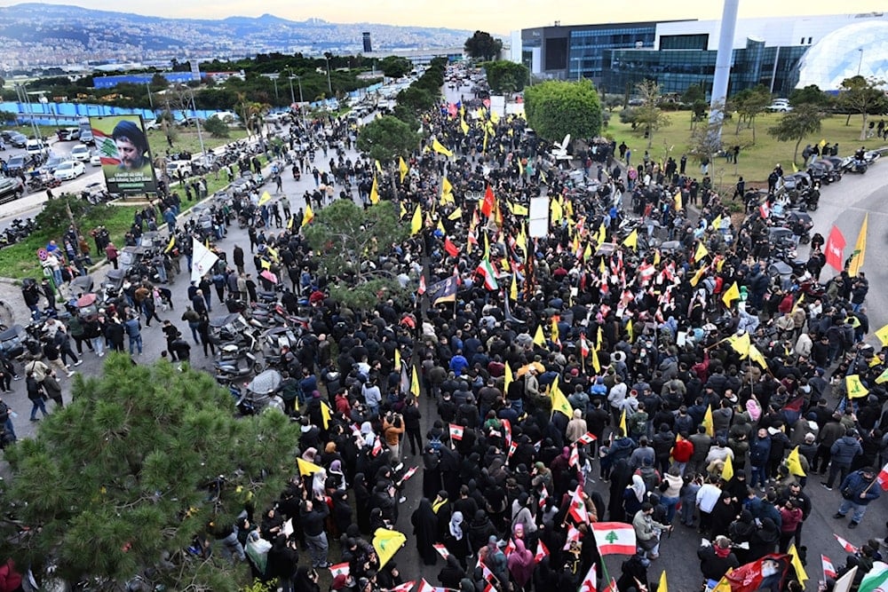 Hezbollah supporters protest near Beirut's international airport against Lebanon's decision to revoke permission for an Iranian carrier in Beirut, Lebanon, Saturday, Feb. 15, 2025 (AP)