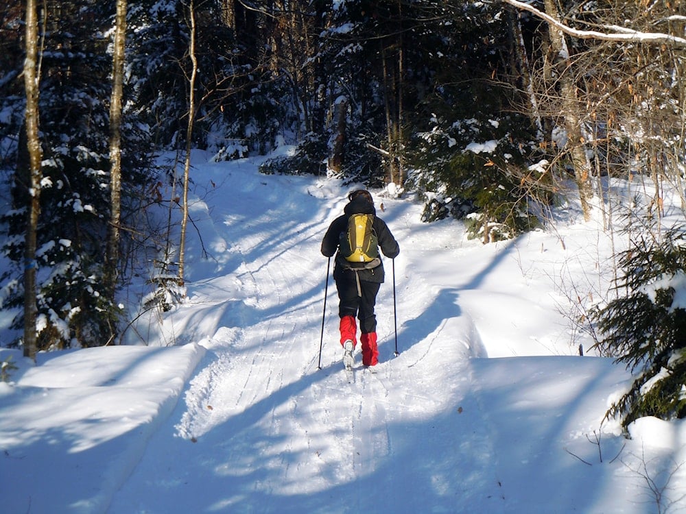 Donna Lawlor goes cross-country skiing on the Lodge to Lodge trail between camps at the Appalachian Mountain Club's backcountry wilderness lodge near Greenville, Maine, in December 2012. (AP)