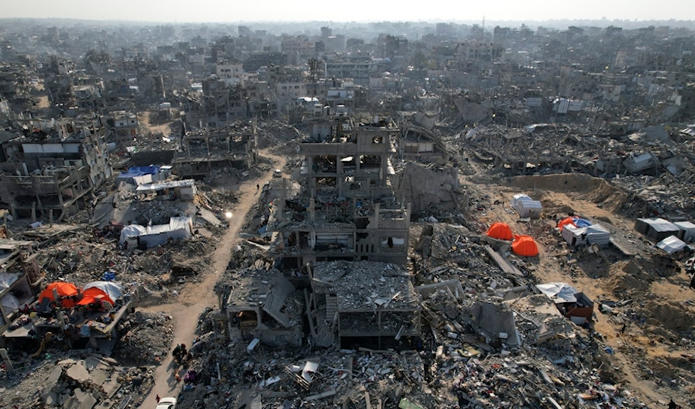 An aerial photograph taken by a drone shows tents amidst the destruction caused by the Israeli occupation in Beit Lahia, northern Gaza Strip, on Monday, Feb. 17, 2025. (AP)