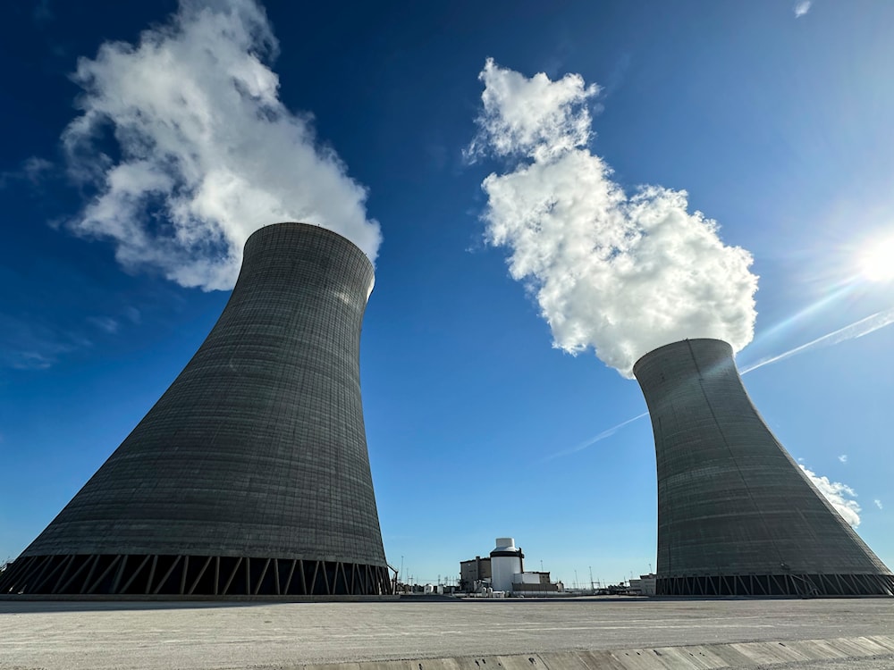 Cooling tower's four, left, and three are seen at the nuclear reactor facility at the Alvin W. Vogtle Electric Generating Plant, Friday, May 31, 2024 (AP)