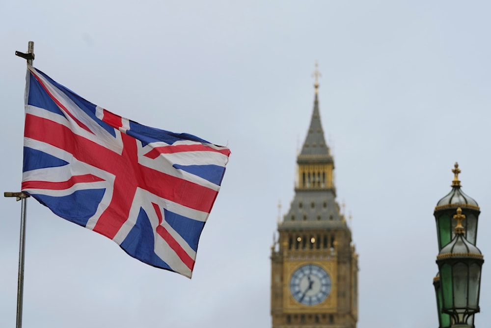 A Union flag flies near Big Ben in London, Friday, Jan. 31, 2025, on the 5th anniversary after the U.K. officially left the European Union. (AP Photo/Kirsty Wigglesworth)