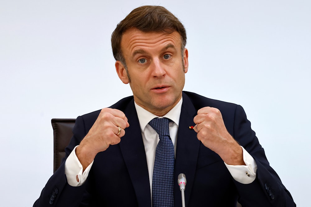 France's President Emmanuel Macron gestures as he delivers a speech during the International Conference on Syria at the Ministerial Conference Center, in Paris, France, Thursday, Feb. 13, 2025 (AP)