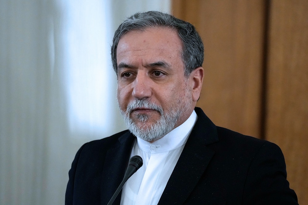 Iranian Foreign Minister Abbas Araghchi attends a joint news briefing with his Turkmen counterpart Rashid Meredov, in Tehran, Iran, Wednesday, Feb. 12, 2025. (AP Photo/Vahid Salemi)