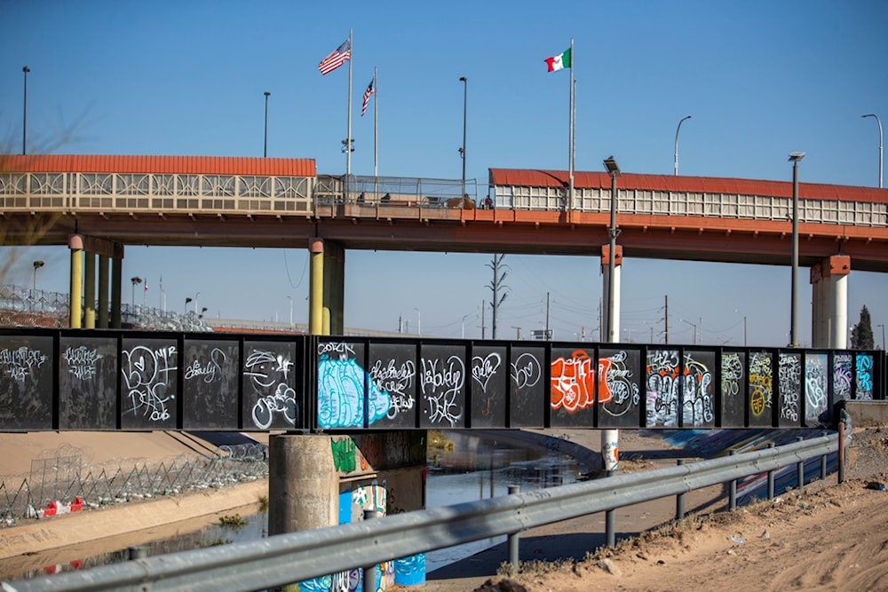 The U.S. and Mexico flags flutter at the Paso del Norte bridge that connects Ciudad Juarez, Mexico and El Paso, Texas, Sunday, Jan. 19, 2025, as seen from Ciudad Juarez, Mexico. (AP)
