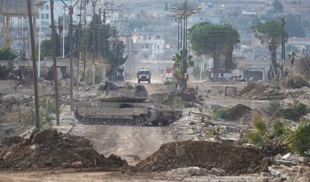 Israeli occupation army armored vehicles block a road leading to the town of Quneitra, Syria, Sunday Jan. 5, 2025.(AP)