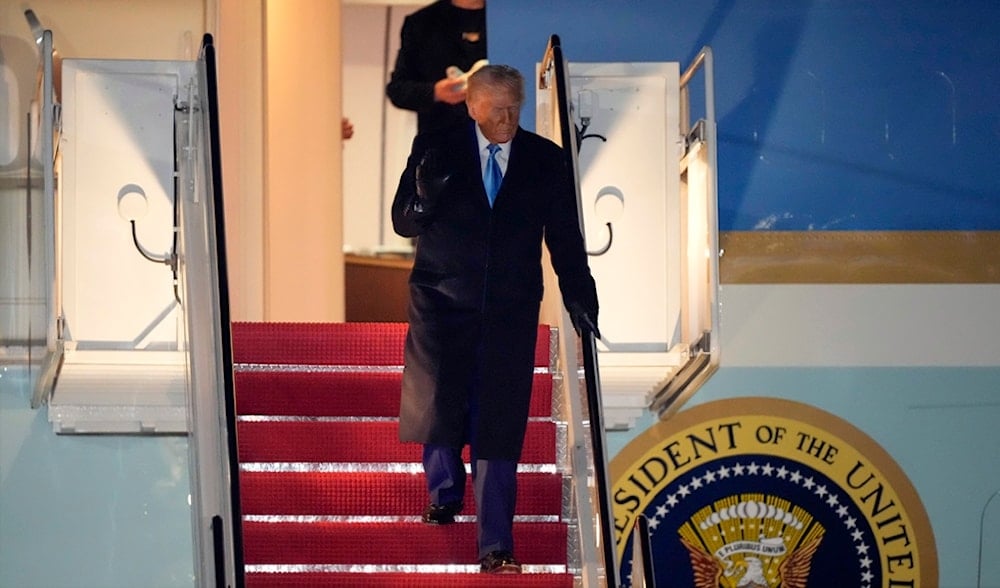 President Donald Trump, followed by Elon Musk, arrives on Air Force One, Wednesday, Feb. 19, 2025, at Joint Base Andrews, Md, after returning from Florida. (AP)