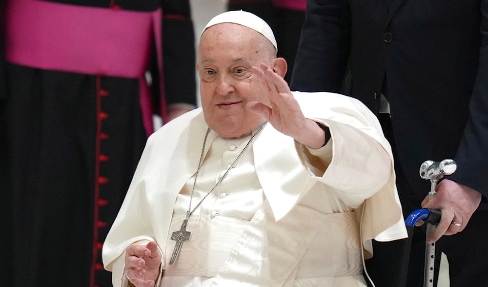 Pope Francis waves as he arrives for his weekly general audience in the Paul VI Hall, at the Vatican, Wednesday, Feb. 12, 2025. (AP)