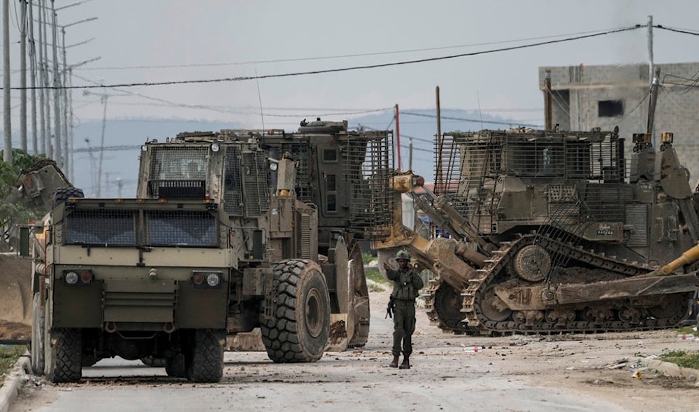 Israeli army vehicles are seen during an offensive in the West Bank city of Jenin, Wednesday, Jan. 22, 2025. (AP)