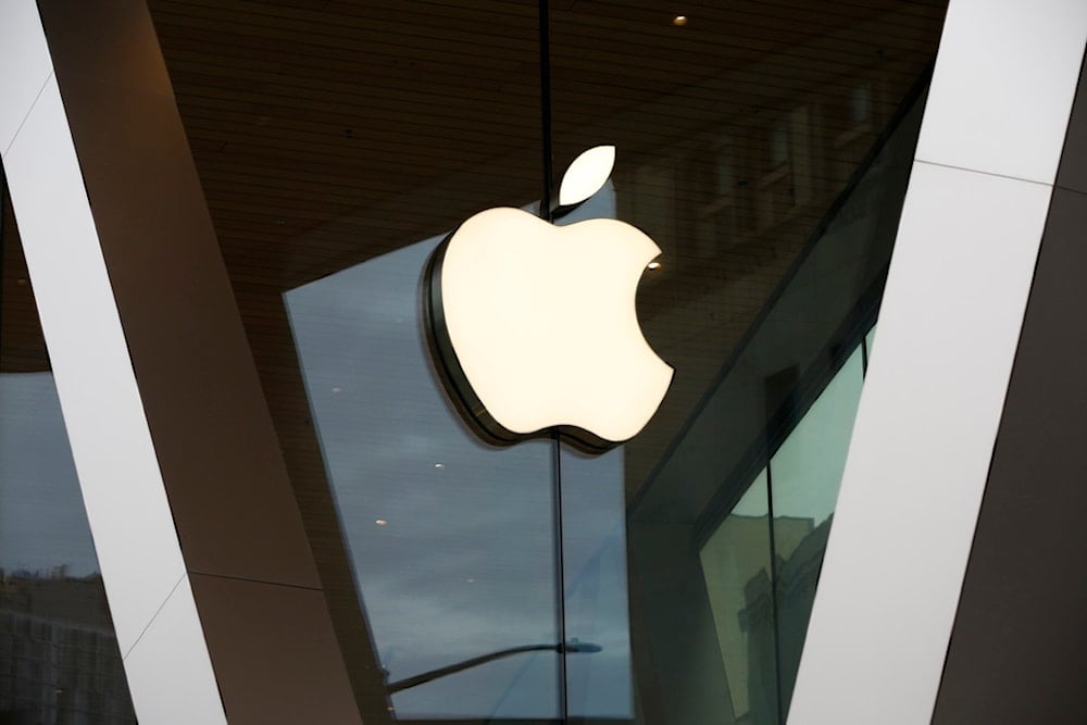 FILE - An Apple logo adorns the facade of the downtown Brooklyn Apple store on March 14, 2020, in New York. (AP Photo/Kathy Willens, File)