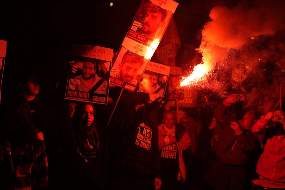 Relatives of captives, held by Hamas in the Gaza Strip, protest outside of the Israeli Security Ministry in Tel Aviv, Monday, Feb. 10, 2025 (AP)  