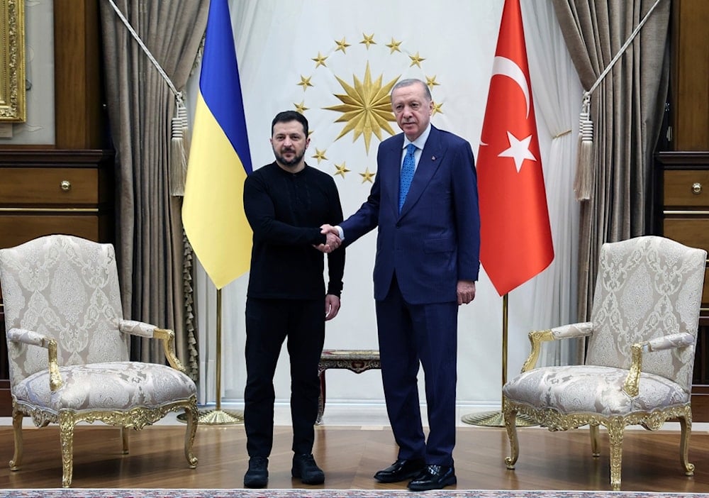 Turkish President Recep Tayyip Erdogan, right, shakes hands with Ukrainian President Volodymyr Zelenskyy during their meeting at the presidential palace in Ankara, Turkey, Tuesday, Feb. 18, 2025. (Turkish Presidency via AP)