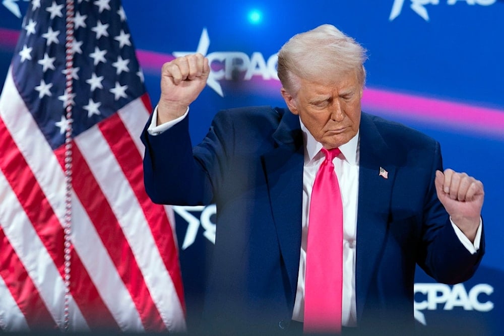 President Donald Trump dances after speaking at the Conservative Political Action Conference, CPAC, at the Gaylord National Resort & Convention Center, Saturday, Feb. 22, 2025, in Oxon Hill, Maryland (AP)