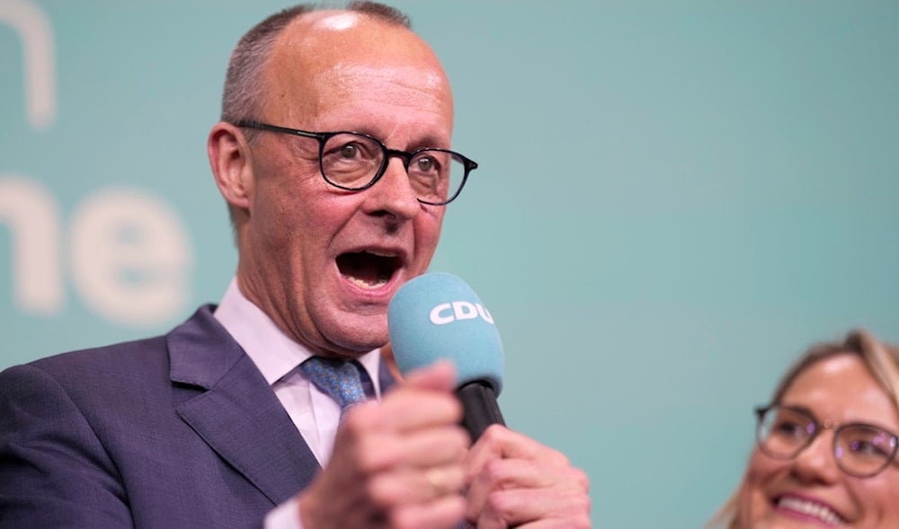 Friedrich Merz, the candidate of the mainstream conservative Christian Democratic Union party, gestures while addressing supporters at the party headquarters in Berlin, Germany, Sunday, Feb. 23, 2025, after the German national election. (AP)