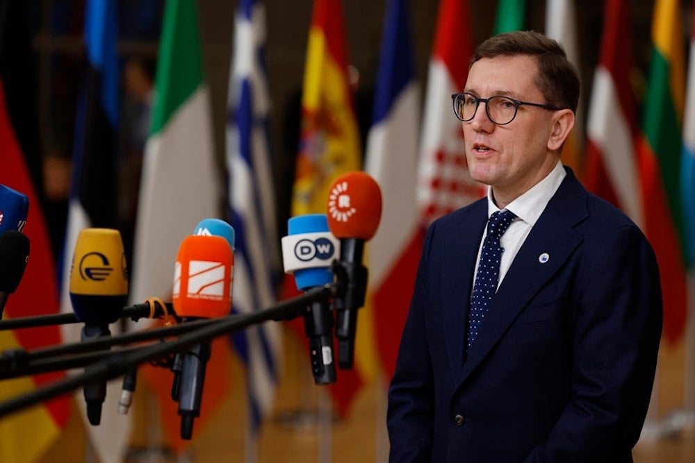 Estonia's Prime Minister Kristen Michal speaks with the media as he arrives for an EU summit at the European Council building in Brussels, Thursday, Dec. 19, 2024. (AP Photo/Geert Vanden Wijngaert)