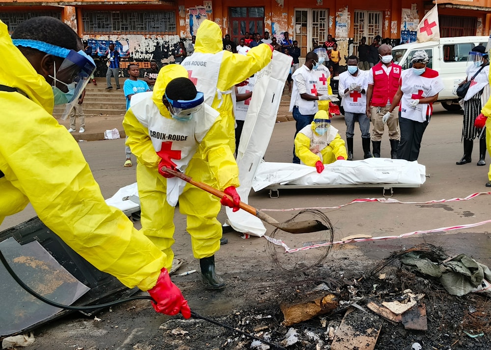 Red Cross workers clear the area in east Congo's second-largest city, Bukavu, one day after it was taken by M23 militants, Monday, Feb. 17, 2025. (AP)