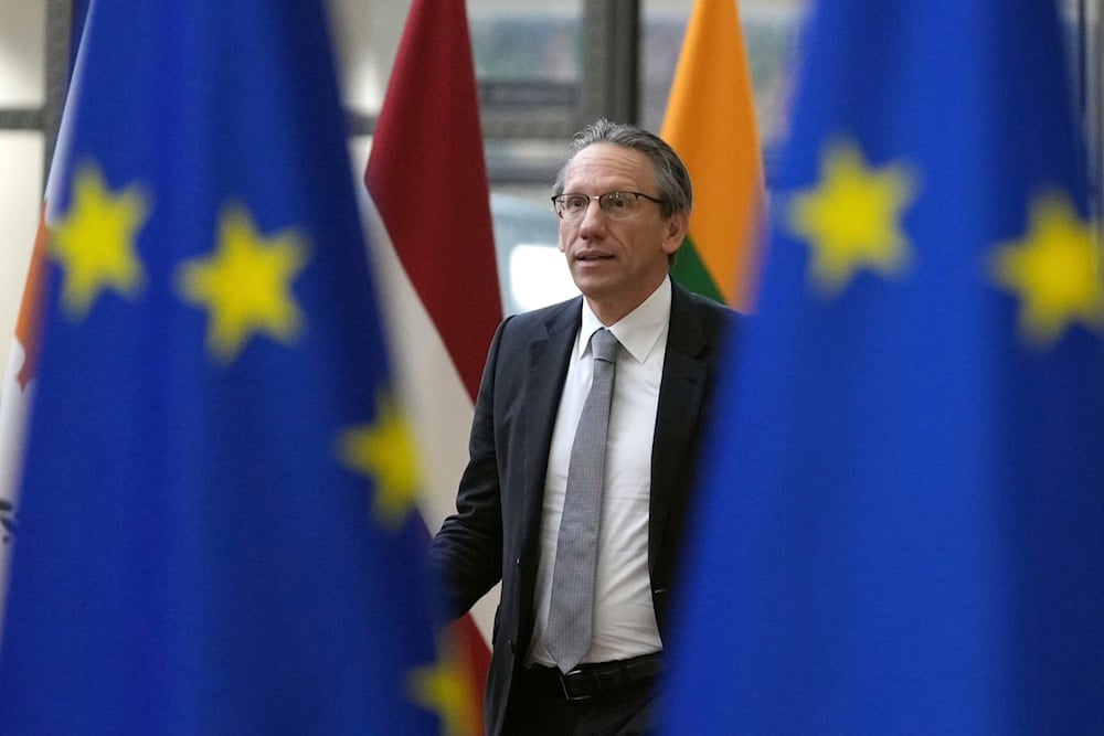 Germany's Finance Minister Jorg Kukies arrives for a meeting of eurogroup finance ministers at the European Council building in Brussels, Monday, Dec. 9, 2024 (AP)