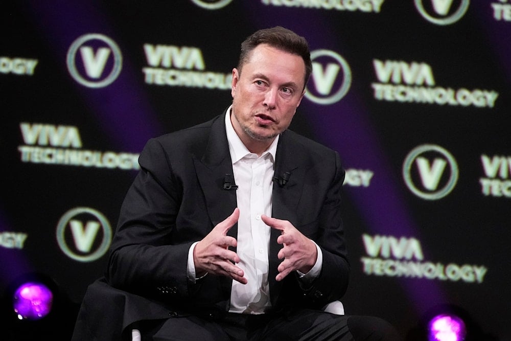 Elon Musk, who owns Twitter, Tesla and SpaceX, speaks at the Vivatech fair on June 16, 2023 in Paris. (AP)