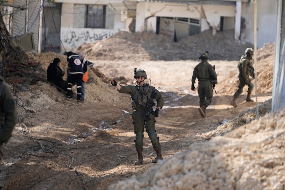 Israeli soldiers are seen during an army operation in the West Bank urban refugee camp of Nur Shams on Wednesday, Feb. 26, 2025 (AP)