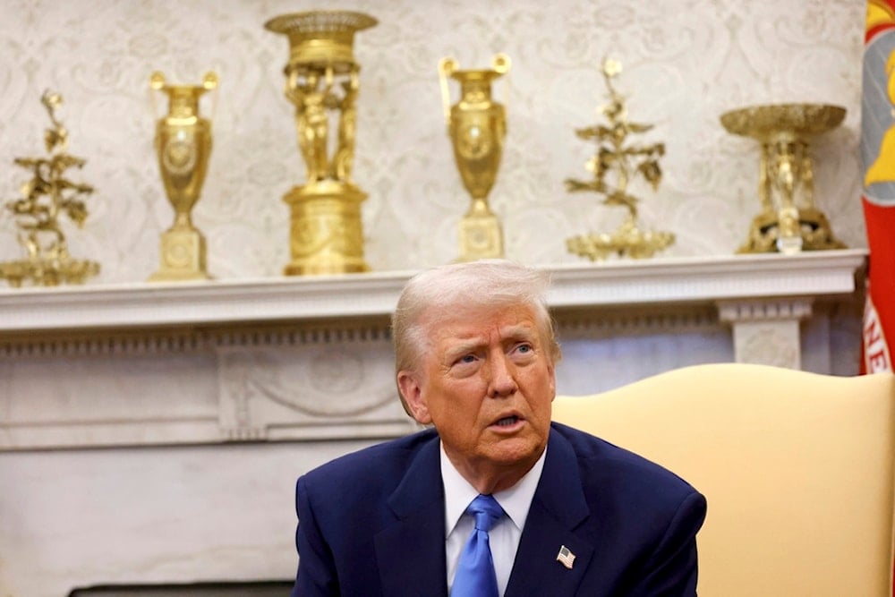 President Donald Trump speaks during a meeting with France's President Emmanuel Macron in the Oval Office of the White House in Washington, Monday, Feb. 24, 2025. (Ludovic Marin/Pool via AP)