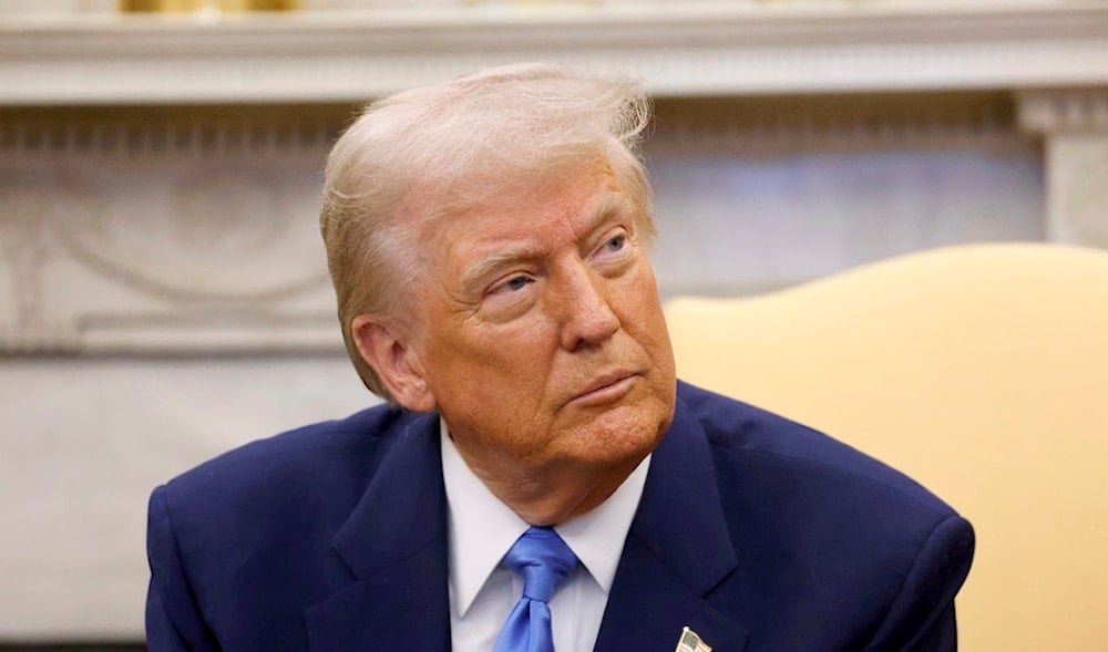 President Donald Trump listens during a meeting with France's President Emmanuel Macron in the Oval Office of the White House in Washington, Monday, Feb. 24, 2025. (AP)