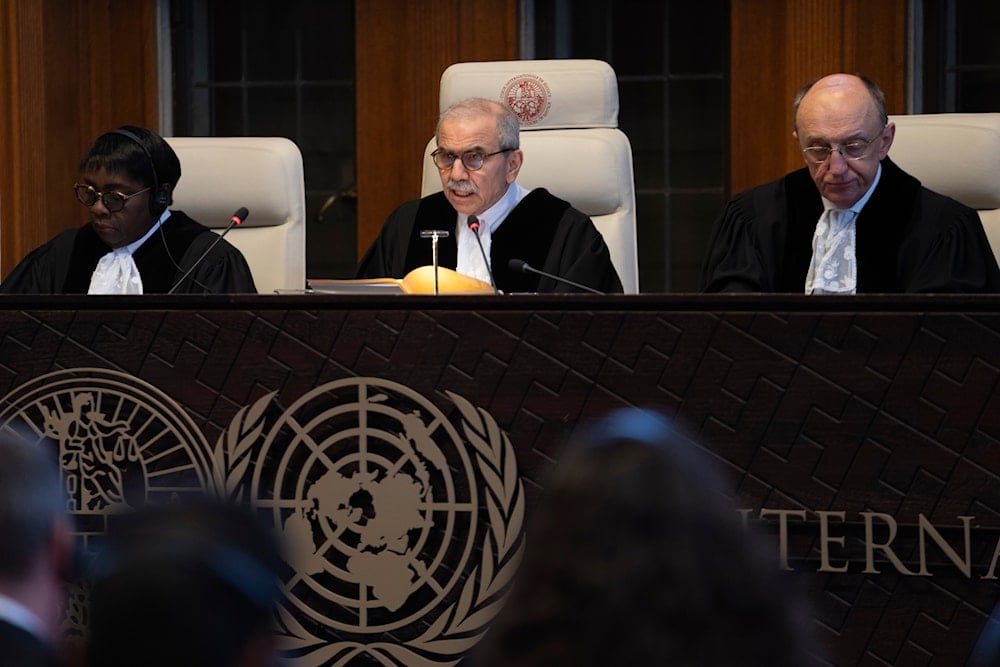 Presiding judge Nawaf Salam, center, opens the court session of the International Court of Justice in The Hague, Netherlands, Tuesday, April 30, 2024. (AP)