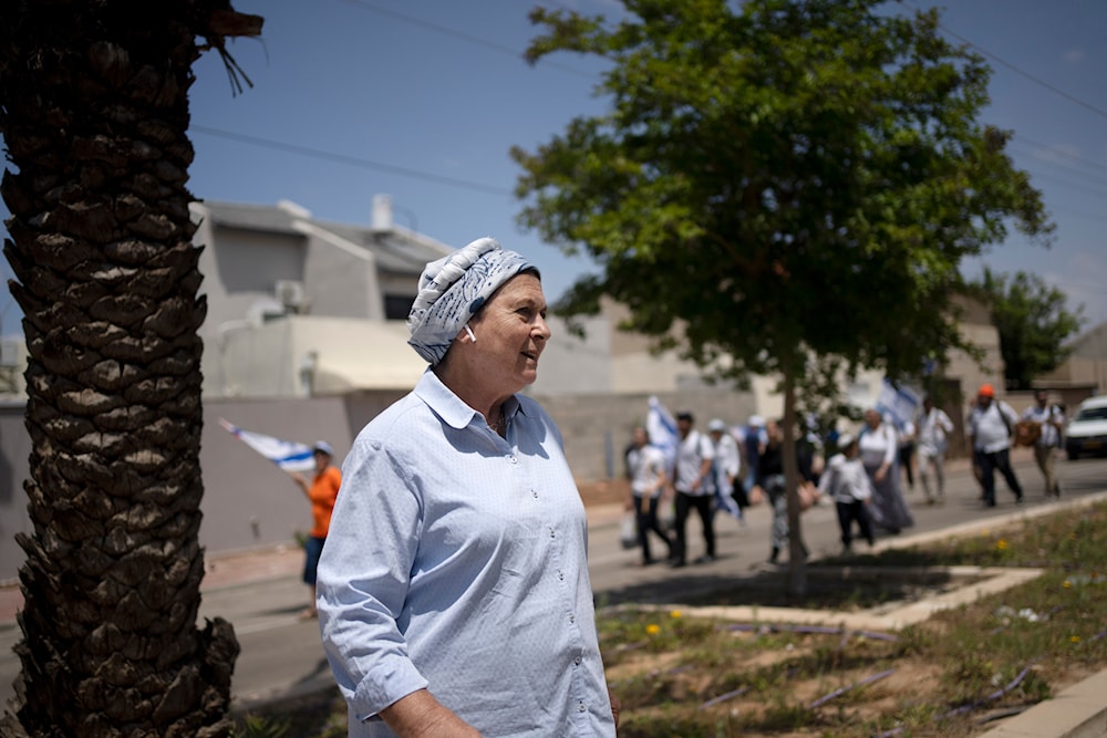 Daniella Weiss, regarded as the godmother of the Israeli settler movement, takes part in a march in Sderot, southern Israel, on Independence Day, Tuesday, May 14, 2024 (AP)