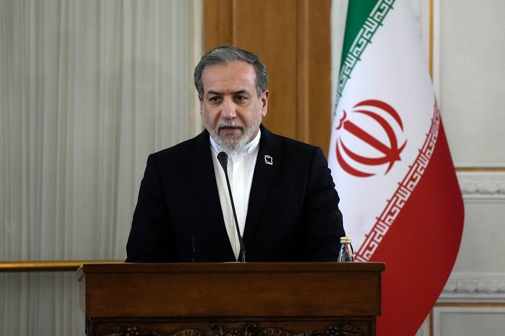 Iranian Foreign Minister Abbas Araghchi speaks in a joint press briefing with his Omani counterpart Sayyid Badr Albusaidi after their meeting in Tehran, Iran, Monday, Dec. 30, 2024 (AP)