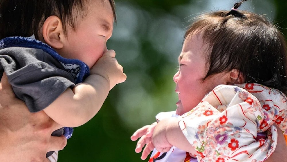 Babies attend an event in Tokyo, Japan, on April 28, 2024. (AFP)