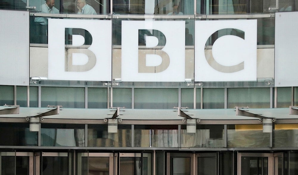 This photo shows a BBC sign outside the entrance to the headquarters of the publicly funded media organization in London, July 19, 2017. (AP)