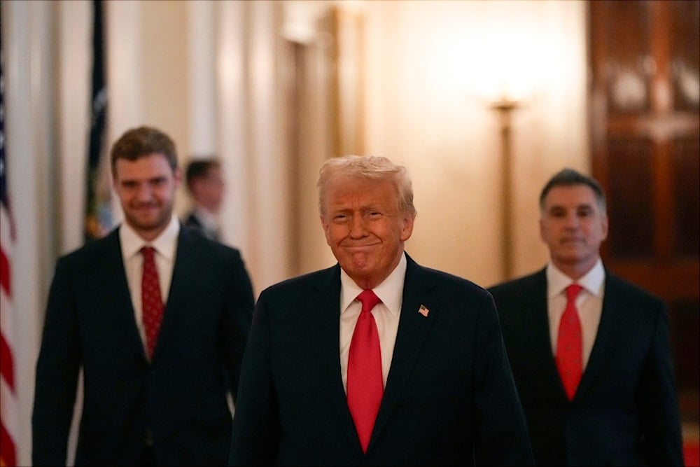 President Donald Trump arrives at the East Room of the White House, Monday, Feb. 3, 2025, in Washington (AP)