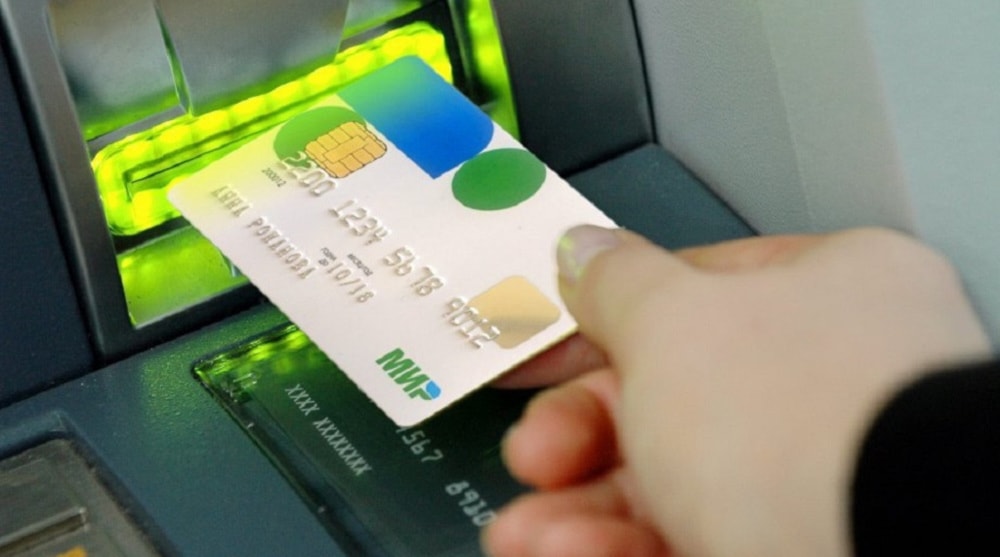 Mir card is inserted in an ATM machine. (Press TV)