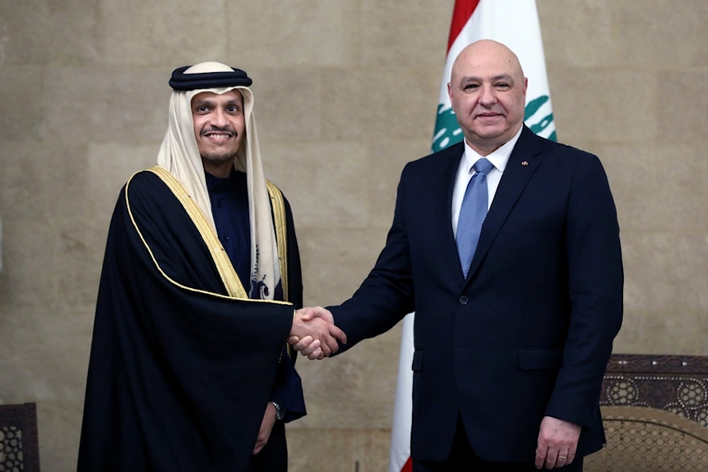 In this photo released by the Lebanese Presidency press office, Lebanese president Joseph Aoun, shakes hands with Qatar's Prime Minister Mohammed bin Abdulrahman bin Jassim Al Thani in Baabda, east of Beirut, Lebanon, Tuesday, February 4, 2025 (AP)