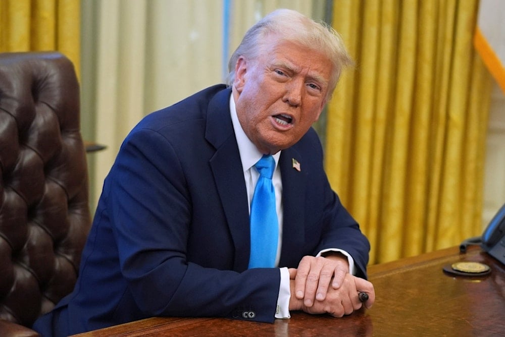 President Donald Trump speaks to reporters as he signs executive orders in the Oval Office of the White House, Tuesday, Feb. 4, 2025, in Washington (AP)