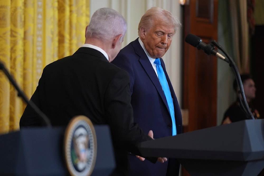 President Donald Trump shakes hands with Israeli occupation Prime Minister Benjamin Netanyahu after a news conference in the East Room of the White House, Tuesday, Feb. 4, 2025, in Washington (AP)