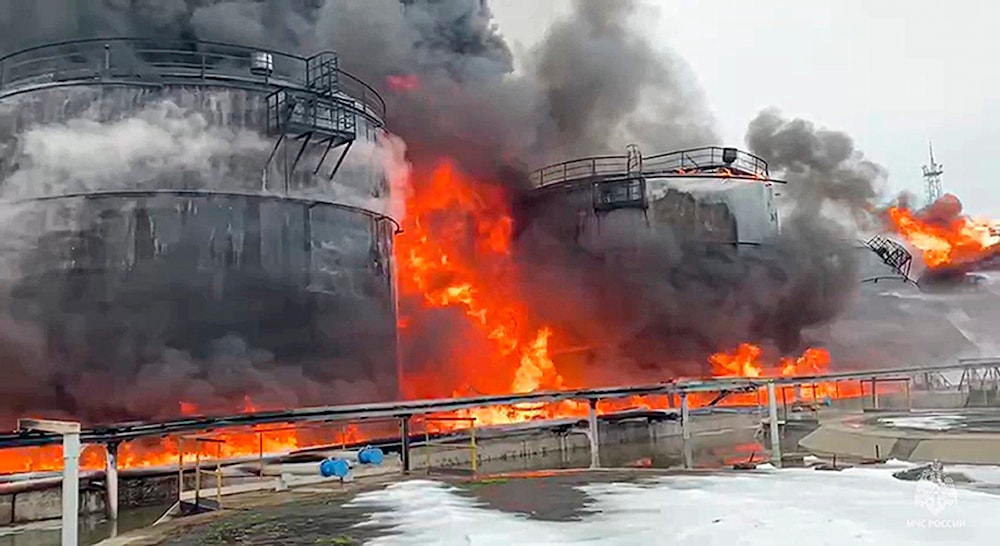 A Ukrainian drone struck an oil depot in Klintsy, Russia, igniting a massive fire. Jan. 19, 2024 (AP)