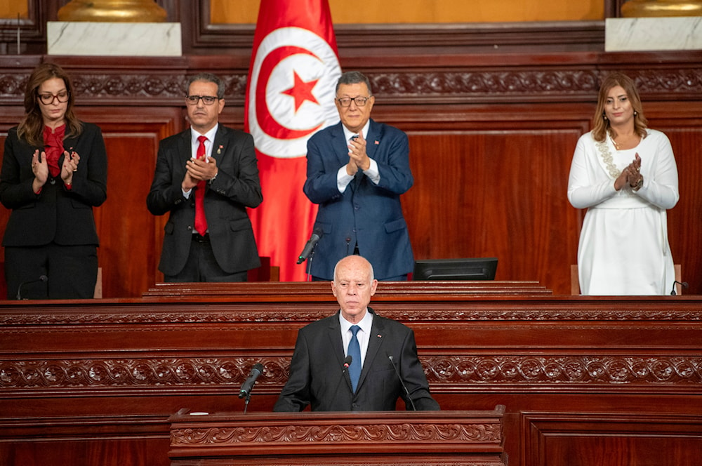 In this photo provided by the Tunisian Presidency, Tunisia's President Kais Saied is applauded after taking oath Monday, Oct.21, 2024 in Tunis following his re-election. (Tunisian Presidency via AP)