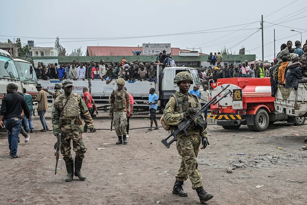 M23 rebels escort government soldiers and police who surrendered to an undisclosed location in Goma, Democratic republic of the Congo, on January 30, 2025. (AP Photo/Moses Sawasawa)