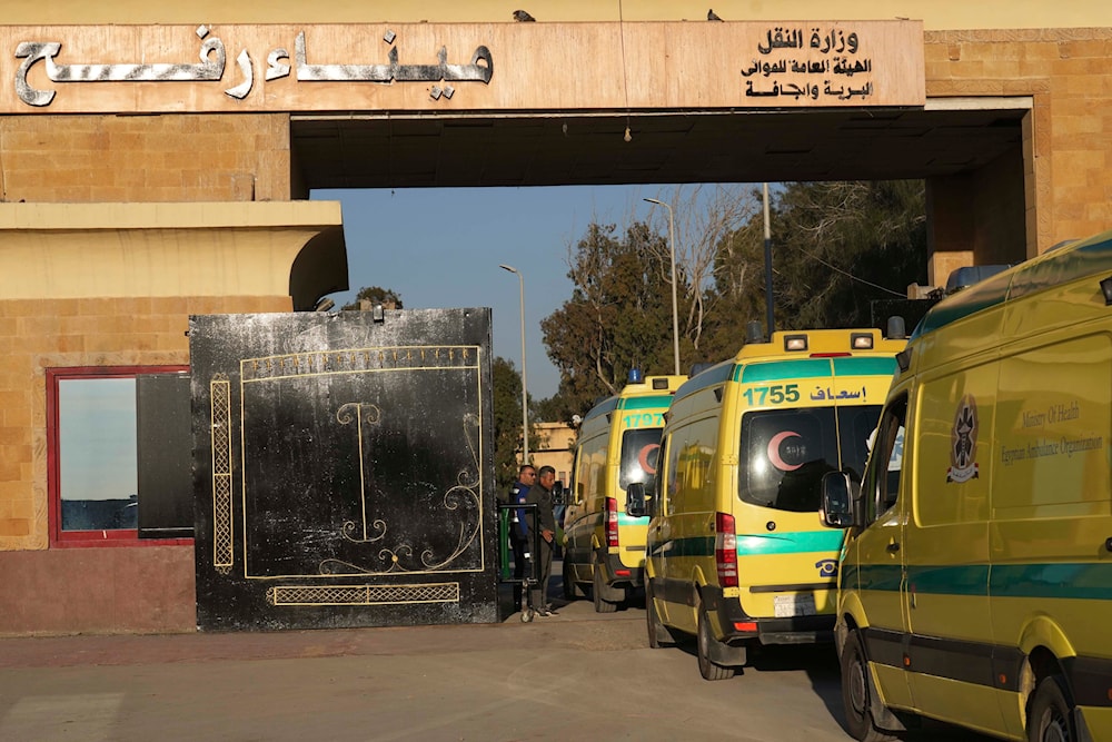 Egyptian ambulances cross the Rafah border crossing in Egypt, Saturday, Feb. 1, 2025. (AP)