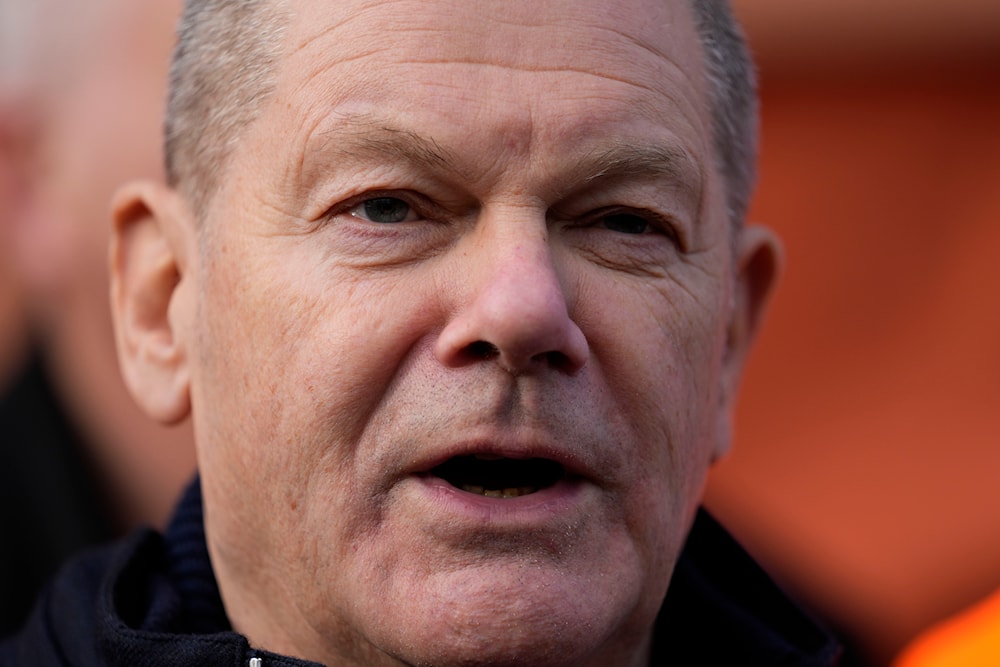 German Chancellor and SPD top candidate Olaf Scholz gives a statement in front of the main factory of struggling steel producer thyssenkrupp ahead of the German federal Bundestag elections later this month in Duisburg, Germany, Tuesday, Feb. 4, 2025. (AP)