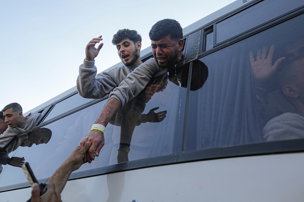 Freed Palestinian prisoners react as they arrive in the Gaza Strip after being released from an Israeli prison following a ceasefire agreement between Hamas and Israel in Khan Younis, on February 1, 2025. (AP Photo/Jehad Alshrafi)