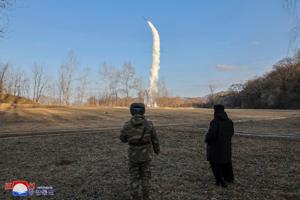 In this photo provided by the DPRK government, leader Kim Jong Un, right, inspects testing of sea-to-surface strategic cruise-guided weapons at an undisclosed location, Saturday, Jan. 25, 2025 (AP)