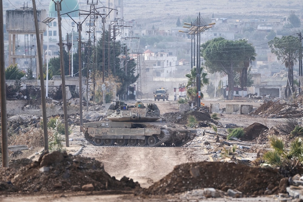 Israeli military armored vehicles block a road leading to the town of Quneitra, Syria, Sunday, Jan. 5, 2025 (AP)