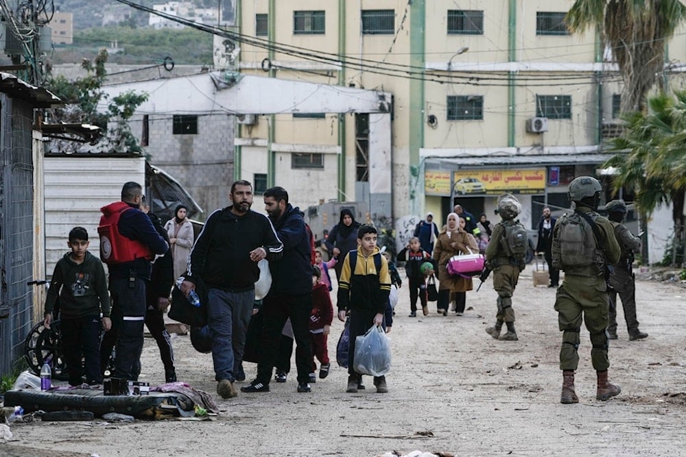 Residents of the Al-Far'a Camp, West Bank, evacuate their homes as the Israeli occupation forces continue their operation in the area, Saturday, February 8, 2025 (AP)