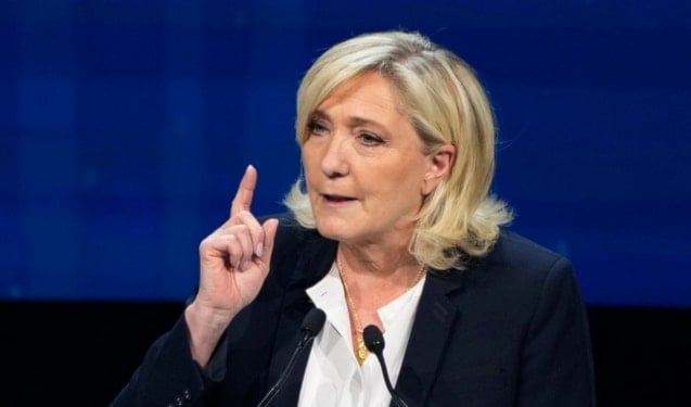 French far-right leader Marine Le Pen makes a speech during the far-right Patriots for Europe summit in Madrid, Spain, Saturday, Feb. 8, 2025. (AP Photo/Paul White)