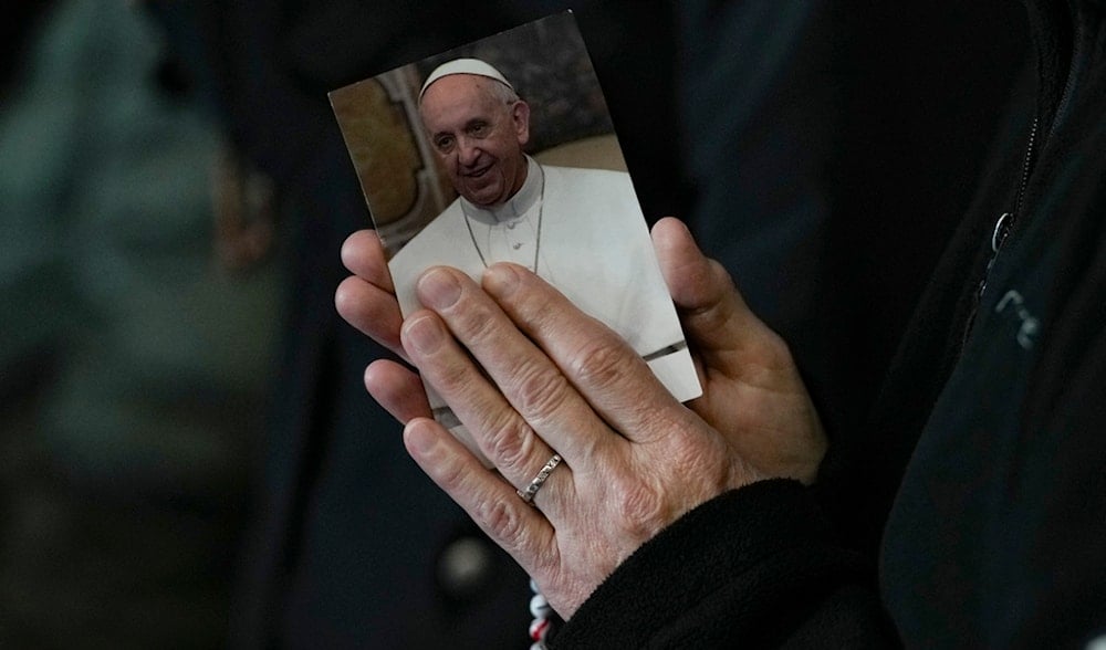 A nun attends a Rosary prayer for Pope Francis, in St. Peter's Square at the Vatican, Monday, March 10, 2025. (AP)