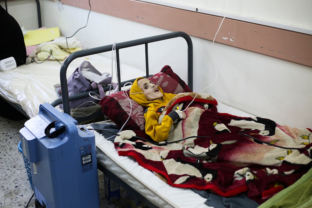 A 10-year-old Palestinian boy, Yazan al-Kafarna, who was born with cerebral palsy, lies at a hospital in Rafah, March 3, 2024. Yazan died due to what his doctor said was extreme muscle wastage caused primarily by a lack of food. (AP)