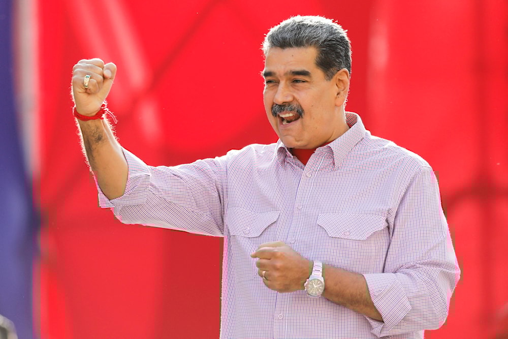 Venezuela's President Nicolás Maduro gestures to supporters during a rally in Caracas, Venezuela, Thursday, Feb. 27, 2025 (AP)