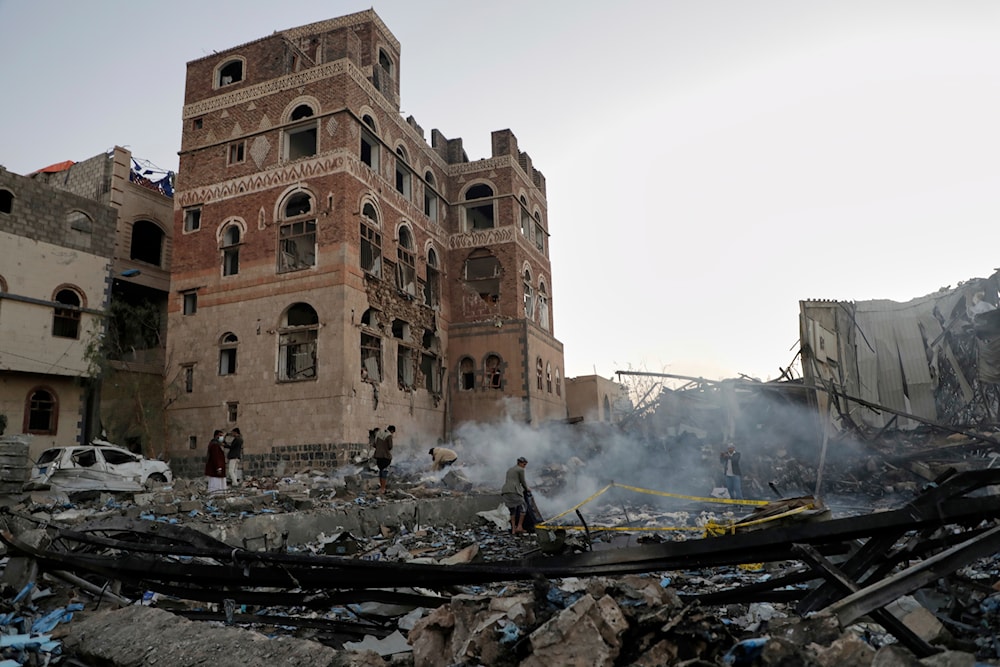 Locals inspect the site reportedly struck by U.S. airstrikes overnight in Sanaa, Yemen, Thursday, March 20, 2025 (AP)